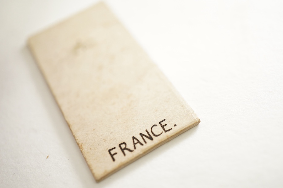 A sentimental signet ring, France, circa 16th century, the circular panel depicting two hearts tied in a true lover's knot, size R1/2, labelled 2244, Provenance: formerly in the collection of Dame Joan Evans (1893-1977)